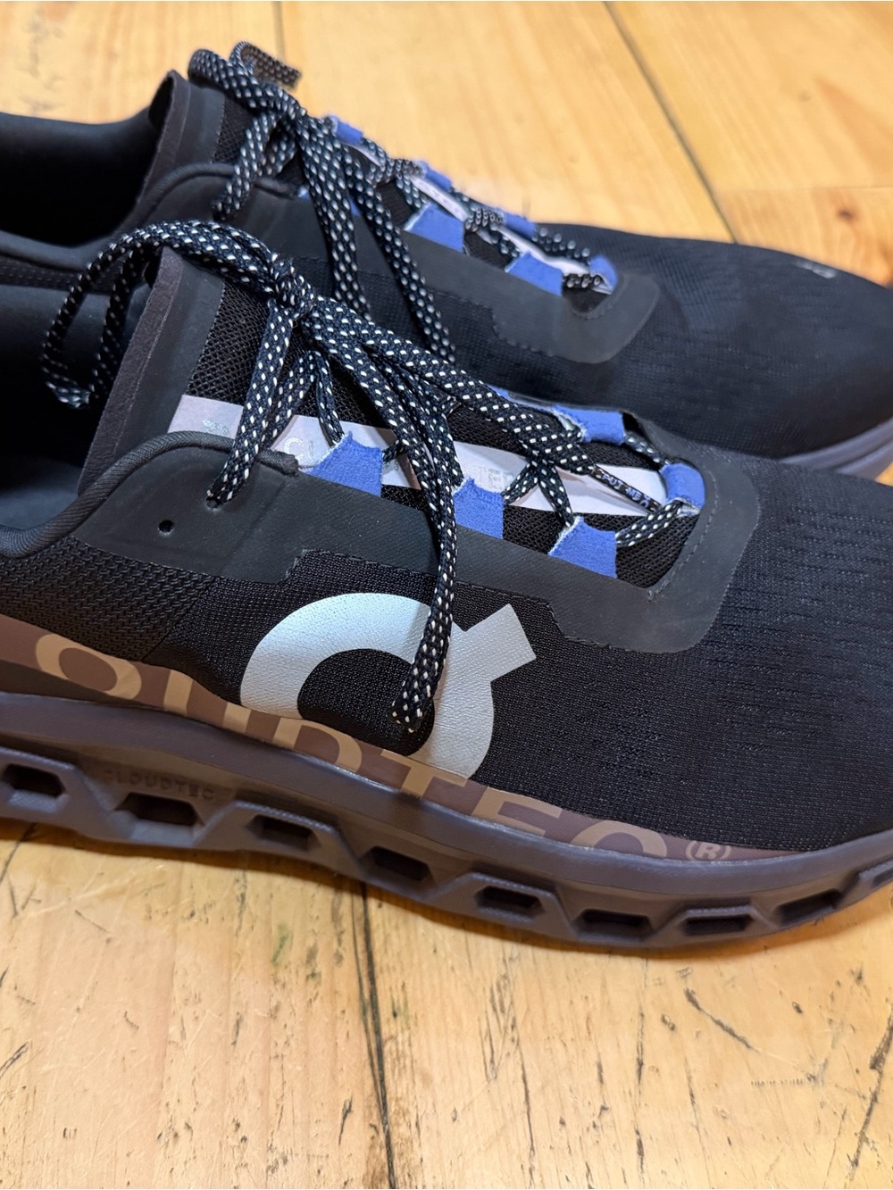 On Running Mens Black Running Shoes with Blue Accents